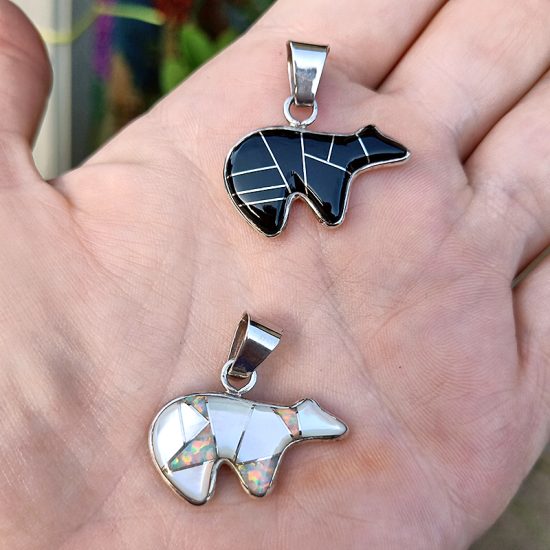 small bear pendants made from sterling silver and inlaid with gemstones